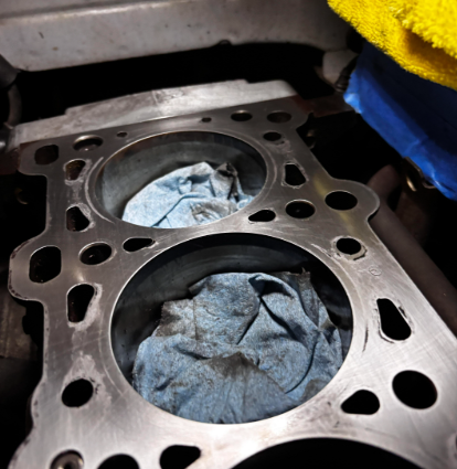 Final solvent cleaning of the engine block for a perfect new gasket seal.